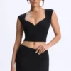 Top Cora din modal cu mâneci scurte și volane, negru Top Cora din modal cu mâneci scurte și volane, negru