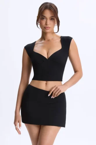 Top Cora din modal cu mâneci scurte și volane, negru