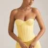 Top corset cu șireturi Araminta în galben pastel Top corset cu șireturi Araminta în galben pastel
