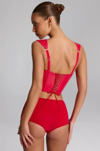 Top corset din vinil cu șireturi Lamiya în roșu aprins