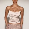 Top corset drapat din satin cu șireturi Yulea, în culoarea auriu Top corset drapat din satin cu șireturi Yulea, în culoarea auriu