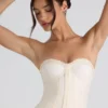 Top corset fără bretele, cu dantelă și volane, Melvina, în culoarea ivoriu Top corset fără bretele, cu dantelă și volane, Melvina, în culoarea ivoriu