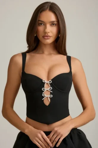 Top corset Pearla cu decupaje și detalii cu fundițe, negru Top corset Pearla cu decupaje și detalii cu fundițe, negru