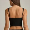 Top corset Pearla cu decupaje și detalii cu fundițe, negru Top corset Pearla cu decupaje și detalii cu fundițe, negru
