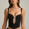 Top corset Pearla cu decupaje și detalii cu fundițe, negru Top corset Pearla cu decupaje și detalii cu fundițe, negru