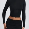 Top cu mâneci lungi și volane Alia din modal, negru Top cu mâneci lungi și volane Alia din modal, negru