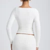Top cu mâneci lungi și volane din modal Emry, în culoarea alb Top cu mâneci lungi și volane din modal Emry, în culoarea alb