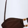 Top de bikini bandeau Manava cu mărgele, în culoarea ciocolată neagră Top de bikini bandeau Manava cu mărgele, în culoarea ciocolată neagră