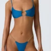 Top de bikini cu decupaje și lanțuri Sanibel, albastru ocean