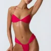 Top de bikini cu gât halter, cu volane și decorațiuni, model Clearwater, în roz zmeură Top de bikini cu gât halter, cu volane și decorațiuni, model Clearwater, în roz zmeură