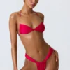 Top de bikini cu gât halter, cu volane și decorațiuni, model Clearwater, în roz zmeură Top de bikini cu gât halter, cu volane și decorațiuni, model Clearwater, în roz zmeură