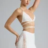Top de bikini Liberty cu bretele încrucișate și ornamente, în culoarea Ivory Top de bikini Liberty cu bretele încrucișate și ornamente, în culoarea Ivory