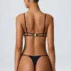 Top de bikini negru cu decupaje și lanțuri Sanibel