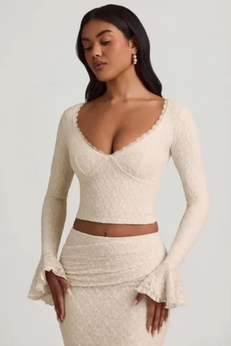 Top din dantelă cu mâneci lungi și volane Dagny, culoare ivoriu Top din dantelă cu mâneci lungi și volane Dagny, culoare ivoriu