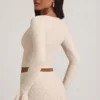 Top din dantelă cu mâneci lungi și volane Dagny, culoare ivoriu Top din dantelă cu mâneci lungi și volane Dagny, culoare ivoriu