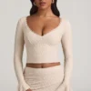 Top din dantelă cu mâneci lungi și volane Dagny, culoare ivoriu Top din dantelă cu mâneci lungi și volane Dagny, culoare ivoriu
