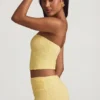 Top din dantelă fără bretele cu volane Tamia, în galben pastel Top din dantelă fără bretele cu volane Tamia, în galben pastel