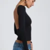 Top Elli din modal, cu guler înalt, mâneci lungi și spate decupat, negru