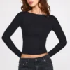 Top Luisa cu mâneci lungi, cu volane și țesătură din modal cu nervuri, în culoarea neagră Top Luisa cu mâneci lungi, cu volane și țesătură din modal cu nervuri, în culoarea neagră
