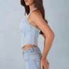 Top în stil corset Lotta cu gât halter din denim deschis Top în stil corset Lotta cu gât halter din denim deschis