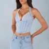Top în stil corset Lotta cu gât halter din denim deschis Top în stil corset Lotta cu gât halter din denim deschis