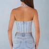 Top în stil corset Lotta cu gât halter din denim deschis Top în stil corset Lotta cu gât halter din denim deschis