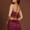 Fustă mini cu talie medie și franjuri Maristella, în culoarea roșu vin Fustă mini cu talie medie și franjuri Maristella, în culoarea roșu vin