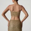 Top scurt cu decupaje și ornamente Ariana, în culoarea auriu