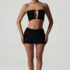 Top scurt cu decupaje și ornamente Ariana, negru Top scurt cu decupaje și ornamente Ariana, negru