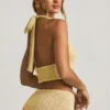 Top scurt cu gât halter Gianna din țesătură bouclé, în culoarea galben Top scurt cu gât halter Gianna din țesătură bouclé, în culoarea galben