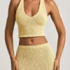 Top scurt cu gât halter Gianna din țesătură bouclé, în culoarea galben Top scurt cu gât halter Gianna din țesătură bouclé, în culoarea galben