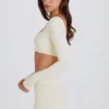 Top scurt cu mâneci lungi, de culoare crem Top scurt cu mâneci lungi, de culoare crem