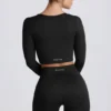 Top scurt cu mâneci lungi fără cusături Super Sculpt în negru