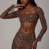 Fustă mini transparentă cu decupaj în V și ornamente Thalassa, culoare ciocolată intensă Fustă mini transparentă cu decupaj în V și ornamente Thalassa, culoare ciocolată intensă
