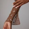 Top scurt cu mâneci lungi, transparent și decorat, model Guilia, în culoarea Mocha Top scurt cu mâneci lungi, transparent și decorat, model Guilia, în culoarea Mocha