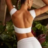 Top scurt cu mâneci scurte și spate decupat Juno, în culoarea alb Top scurt cu mâneci scurte și spate decupat Juno, în culoarea alb