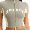 Top scurt din jersey de bumbac cu fermoar și blocuri de culoare, în nuanța Mineral Top scurt din jersey de bumbac cu fermoar și blocuri de culoare, în nuanța Mineral