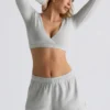 Top scurt din jersey periat cu decolteu în V, culoare gri ceață Top scurt din jersey periat cu decolteu în V, culoare gri ceață
