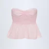Top scurt fără bretele din poplin de bumbac cu nod în față Alma în dungi roz și alb Top scurt fără bretele din poplin de bumbac cu nod în față Alma în dungi roz și alb