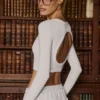 Top scurt fără cusături, cu decupaje, din tricot moale, în culoarea alb Top scurt fără cusături, cu decupaje, din tricot moale, în culoarea alb