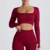Top scurt fără cusături Super Sculpt cu mâneci lungi, în culoarea burgund Top scurt fără cusături Super Sculpt cu mâneci lungi, în culoarea burgund
