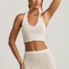 Top scurt Gianna cu gât halter din țesătură bouclé, alb Top scurt Gianna cu gât halter din țesătură bouclé, alb