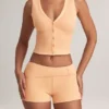 Top vestă cu nasturi din modal cu nervuri Lene, culoare piersică