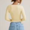 Topuri cu mâneci lungi și volane Emry Modal, în culoarea galben crem