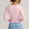 Topuri cu mâneci lungi și volane Emry Modal, în roz pal Topuri cu mâneci lungi și volane Emry Modal, în roz pal