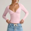 Topuri cu mâneci lungi și volane Emry Modal, în roz pal Topuri cu mâneci lungi și volane Emry Modal, în roz pal