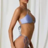 Topuri de bikini Cortez cu detalii din perle și bretele încrucișate, în culoarea violet lavandă Topuri de bikini Cortez cu detalii din perle și bretele încrucișate, în culoarea violet lavandă
