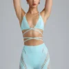 Topuri de bikini Liberty cu bretele încrucișate și ornamente, în culoarea albastru gheață Topuri de bikini Liberty cu bretele încrucișate și ornamente, în culoarea albastru gheață