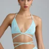 Topuri de bikini Liberty cu bretele încrucișate și ornamente, în culoarea albastru gheață Topuri de bikini Liberty cu bretele încrucișate și ornamente, în culoarea albastru gheață