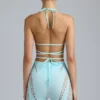 Topuri de bikini Liberty cu bretele încrucișate și ornamente, în culoarea albastru gheață Topuri de bikini Liberty cu bretele încrucișate și ornamente, în culoarea albastru gheață